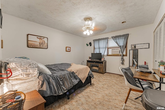 147 Northville Dr, Lincoln, IL 62656 - bedroom with cooling unit, light colored carpet, a textured ceiling, and a closet