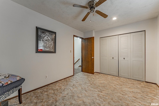147 Northville Dr, Lincoln, IL 62656 - carpeted bedroom featuring a textured ceiling, ceiling fan, a closet, and recessed lighting