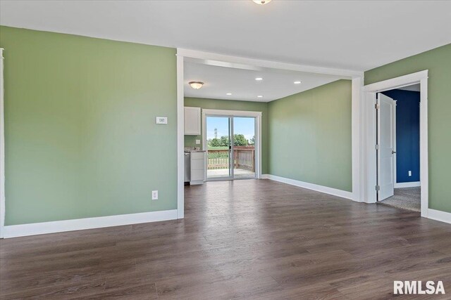 210 Prairie Run, Illiopolis, IL 62539 - spare room with dark wood-type flooring and recessed lighting