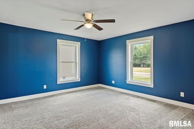 210 Prairie Run, Illiopolis, IL 62539 - unfurnished room with a ceiling fan and carpet floors
