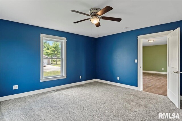 210 Prairie Run, Illiopolis, IL 62539 - carpeted spare room with ceiling fan and a smoke detector