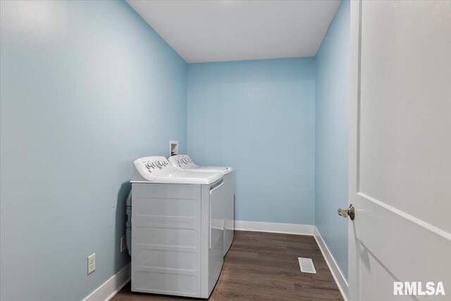 210 Prairie Run, Illiopolis, IL 62539 - washroom with separate washer and dryer and dark wood finished floors