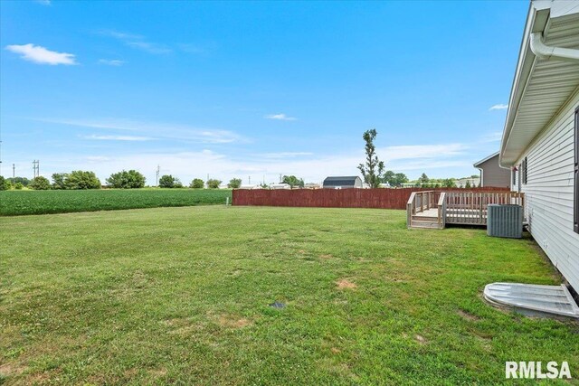 210 Prairie Run, Illiopolis, IL 62539 - view of green lawn featuring a wooden deck