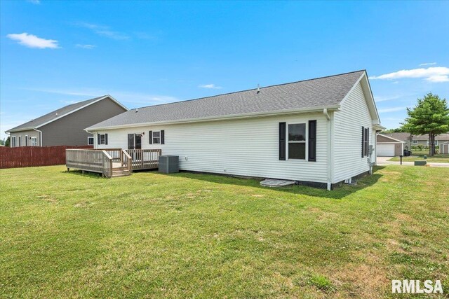 210 Prairie Run, Illiopolis, IL 62539 - rear view of property with a wooden deck and a detached garage
