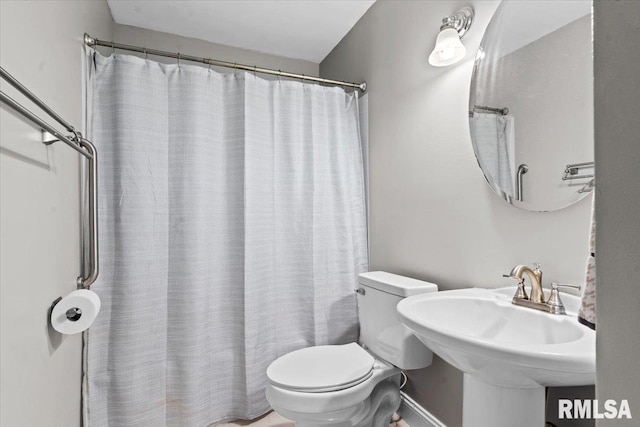 3328 Mars Ave, Springfield, IL 62707 - bathroom with toilet and a shower with curtain