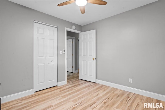 3328 Mars Ave, Springfield, IL 62707 - unfurnished bedroom featuring wood finished floors and a ceiling fan