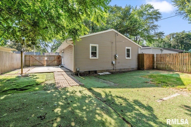 3328 Mars Ave, Springfield, IL 62707 - back of property with a fenced backyard and a patio