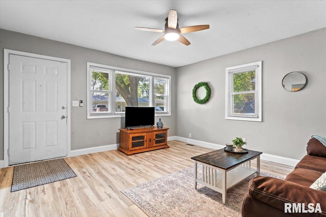 3328 Mars Ave, Springfield, IL 62707 - living room with plenty of natural light, ceiling fan, and light wood-type flooring