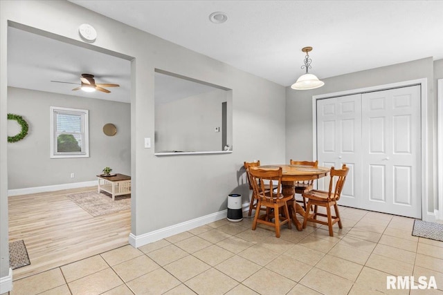 3328 Mars Ave, Springfield, IL 62707 - dining space with light tile patterned floors and a ceiling fan