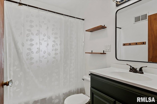 2912 E Enos Ave, Springfield, IL 62702 - bathroom featuring vanity and shower / bath combo