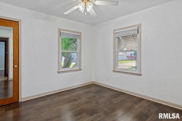 2912 E Enos Ave, Springfield, IL 62702 - unfurnished room with dark wood finished floors and ceiling fan