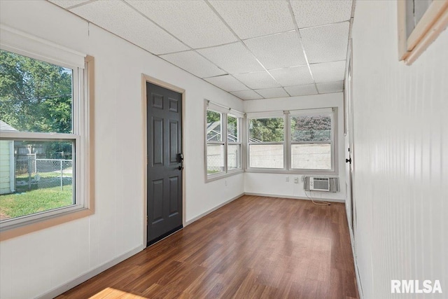 2912 E Enos Ave, Springfield, IL 62702 - foyer entrance with a wall mounted air conditioner, wood finished floors, a drop ceiling, and plenty of natural light