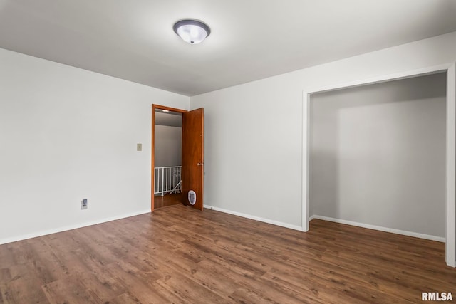 113 W Walnut St, Chatham, IL 62629 - spare room featuring wood finished floors and baseboards