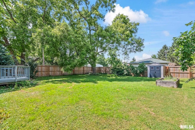 113 W Walnut St, Chatham, IL 62629 - fenced backyard featuring a storage shed and a wooden deck