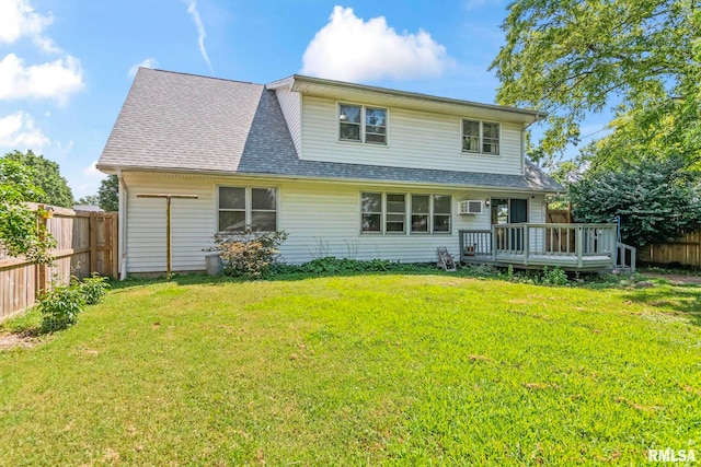 113 W Walnut St, Chatham, IL 62629 - rear view of house with a deck, a fenced backyard, an AC wall unit, and a shingled roof