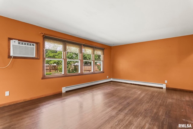 113 W Walnut St, Chatham, IL 62629 - unfurnished room featuring wood finished floors, a baseboard radiator, a wall mounted air conditioner, and a baseboard heating unit