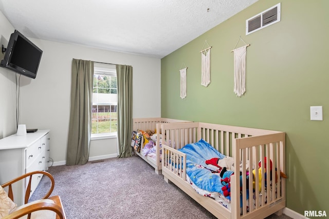 16540 Wernowsky St, Petersburg, IL 62675 - bedroom featuring carpet flooring and a crib