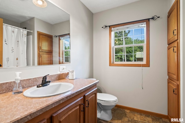 16540 Wernowsky St, Petersburg, IL 62675 - bathroom with vanity, stone finish flooring, and a shower with curtain
