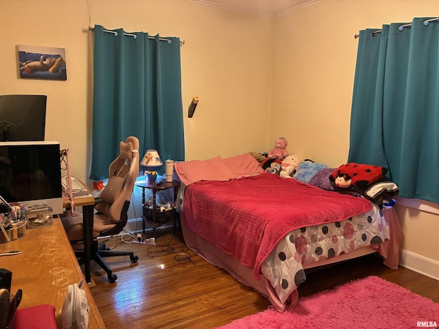 700 S 20th St, Quincy, IL 62301 - bedroom featuring wood finished floors, crown molding, and an office area