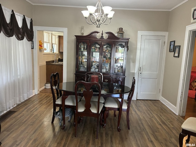 700 S 20th St, Quincy, IL 62301 - dining area featuring a chandelier, dark wood-style floors, and ornamental molding