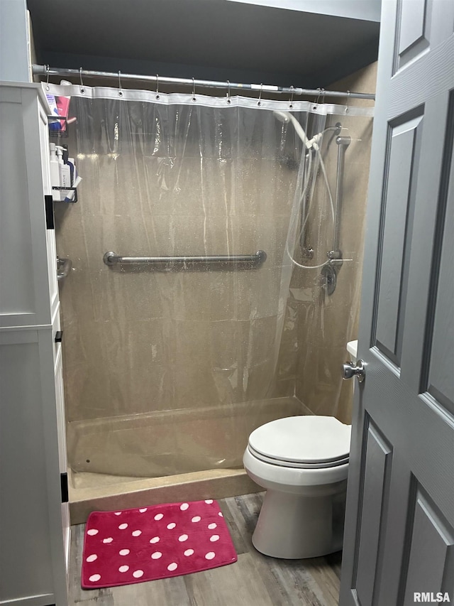 700 S 20th St, Quincy, IL 62301 - full bath with wood finished floors and a stall shower