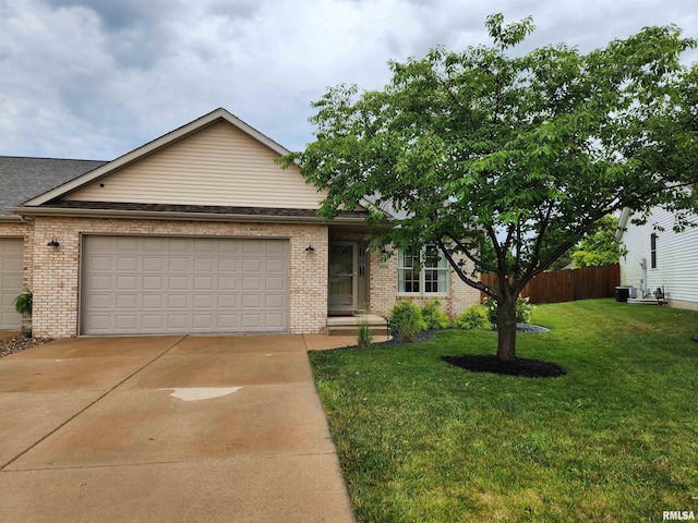 2302 Knoxville Dr, Springfield, IL 62711 - view of front of house featuring an attached garage, brick siding, and concrete driveway