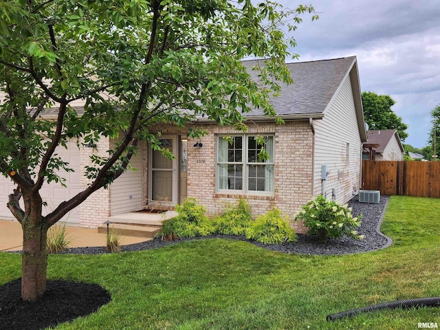 2302 Knoxville Dr, Springfield, IL 62711 - view of front of house featuring brick siding, a shingled roof, and an attached garage