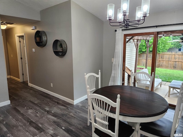 2302 Knoxville Dr, Springfield, IL 62711 - dining space with dark wood finished floors and a chandelier