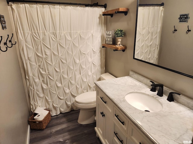 2302 Knoxville Dr, Springfield, IL 62711 - full bath with wood finished floors, vanity, and curtained shower