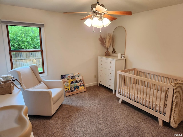 2302 Knoxville Dr, Springfield, IL 62711 - carpeted bedroom featuring a nursery area and ceiling fan