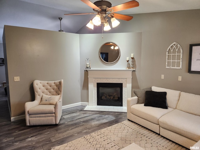 2302 Knoxville Dr, Springfield, IL 62711 - living room with wood finished floors, a ceiling fan, and a tiled fireplace