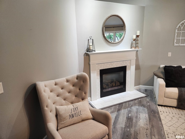 2302 Knoxville Dr, Springfield, IL 62711 - living room featuring wood finished floors and a fireplace