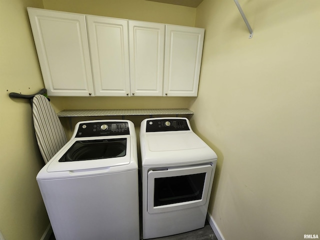 2302 Knoxville Dr, Springfield, IL 62711 - laundry room featuring washing machine and clothes dryer and cabinet space