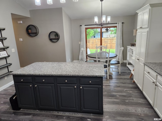2302 Knoxville Dr, Springfield, IL 62711 - kitchen featuring a chandelier, white cabinetry, dark cabinets, and dark wood finished floors