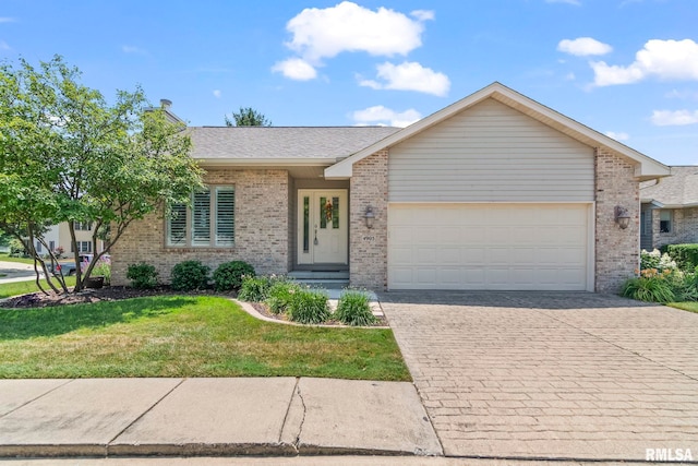 4905 Eagles Lndg, Springfield, IL 62711 - view of front of property featuring brick siding, an attached garage, driveway, a front yard, and roof with shingles