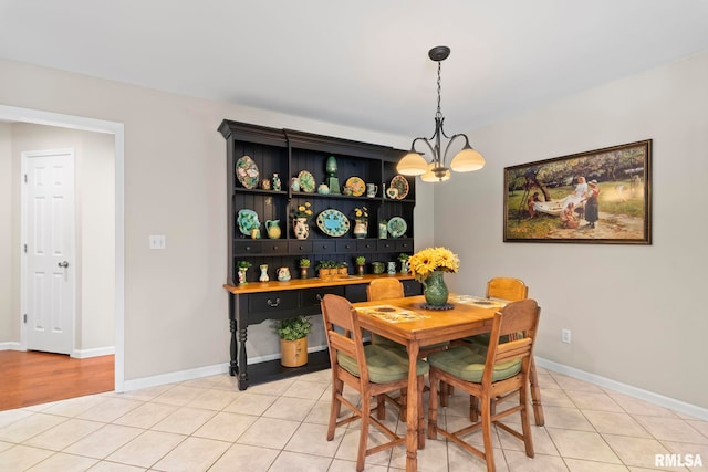 4905 Eagles Lndg, Springfield, IL 62711 - dining space with a chandelier and light tile patterned floors