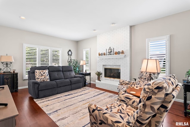 4905 Eagles Lndg, Springfield, IL 62711 - living area with wood finished floors, a brick fireplace, and recessed lighting