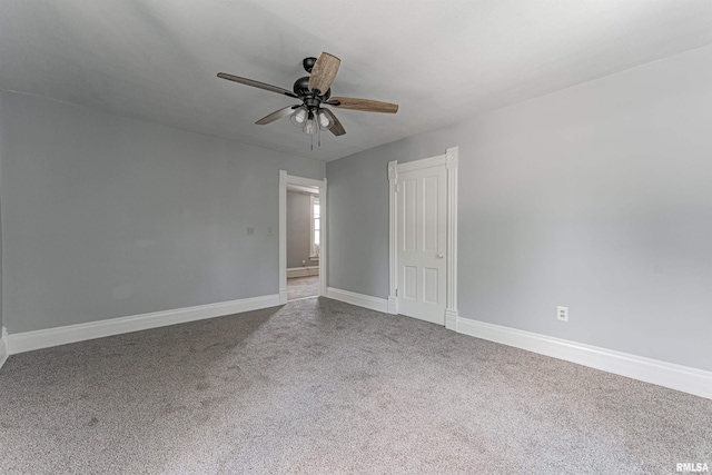 418 E Cooke St, Mount Pulaski, IL 62548 - empty room with carpet floors and a ceiling fan