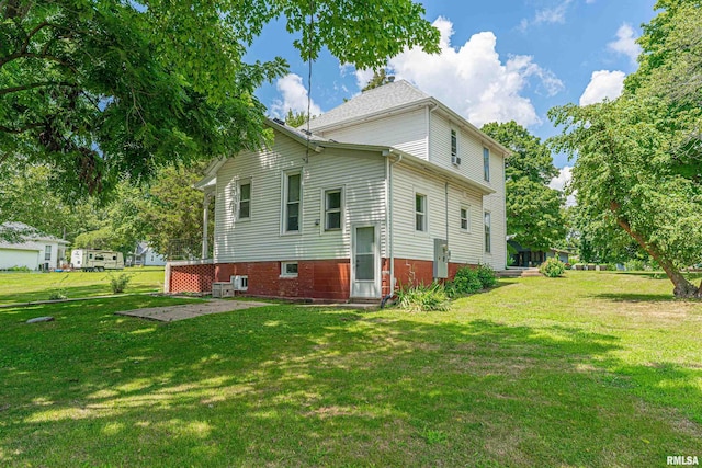418 E Cooke St, Mount Pulaski, IL 62548 - back of house with a lawn