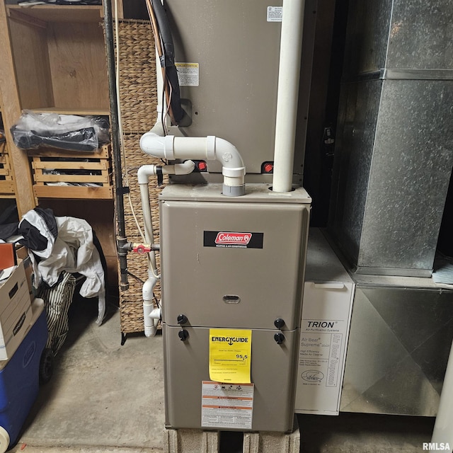 704 N Cherry St, Abingdon, IL 61410 - utility room featuring heating unit