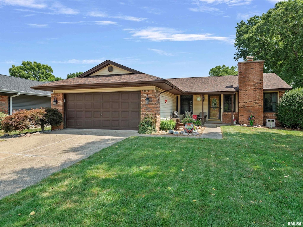 10 Hollybrook Dr, Springfield, IL 62702 - ranch-style house with an attached garage, brick siding, a front lawn, driveway, and a chimney