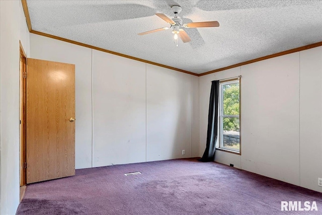 913 Springfield St, Kincaid, IL 62540 - empty room featuring ornamental molding, carpet flooring, a textured ceiling, and a ceiling fan