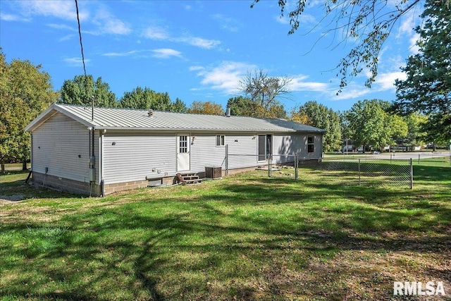 913 Springfield St, Kincaid, IL 62540 - rear view of property featuring entry steps and a metal roof