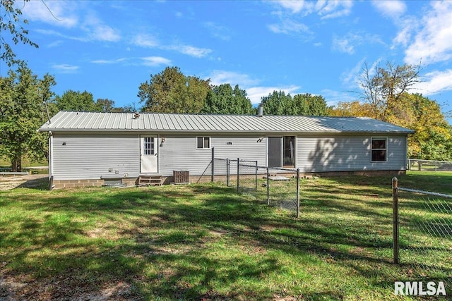 913 Springfield St, Kincaid, IL 62540 - rear view of property with entry steps, a metal roof, and a gate