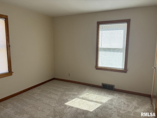 2308 S Whittier Ave, Springfield, IL 62704 - carpeted empty room with baseboards