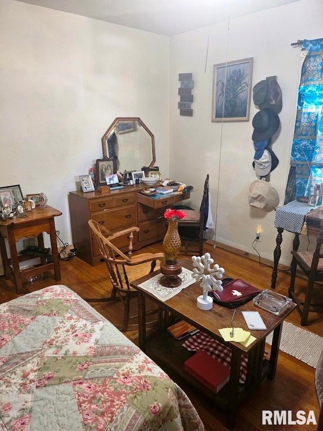 707 E Clark St, Litchfield, IL 62056 - bedroom featuring wood finished floors and baseboards