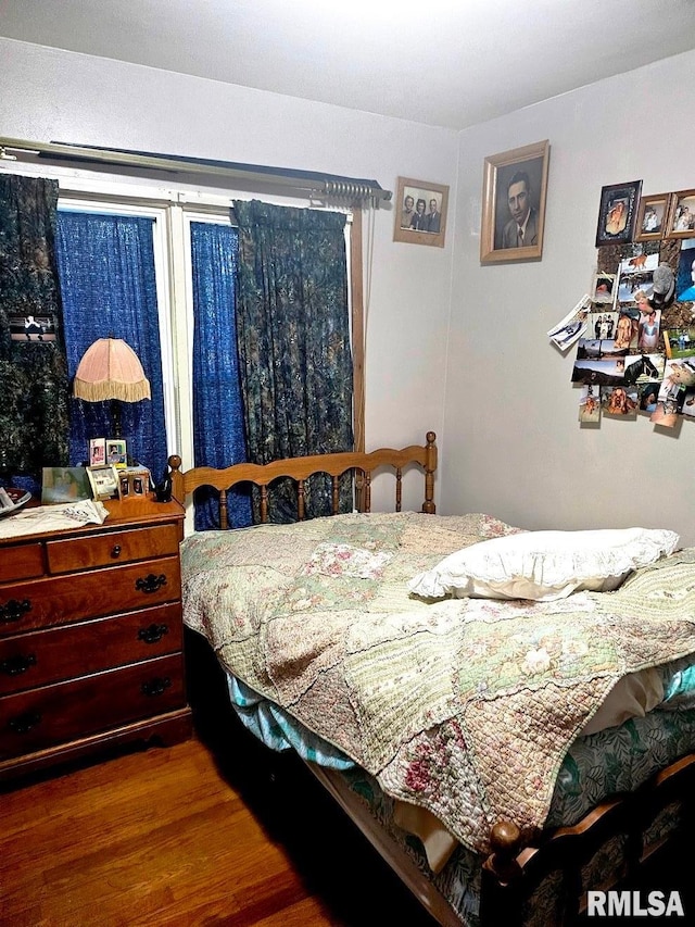 707 E Clark St, Litchfield, IL 62056 - bedroom featuring wood finished floors