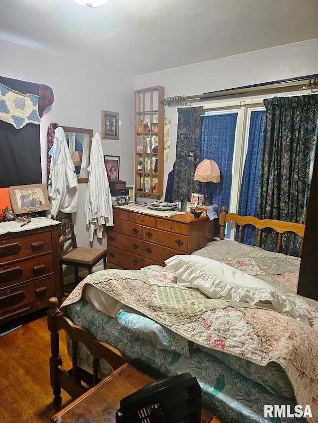 707 E Clark St, Litchfield, IL 62056 - bedroom featuring wood finished floors