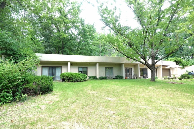 604 Knox Rd N Unit 1000, Gilson, IL 61436 - view of front of property featuring stucco siding and a front lawn