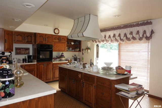 604 Knox Rd N Unit 1000, Gilson, IL 61436 - kitchen featuring black oven, light countertops, ventilation hood, and open shelves